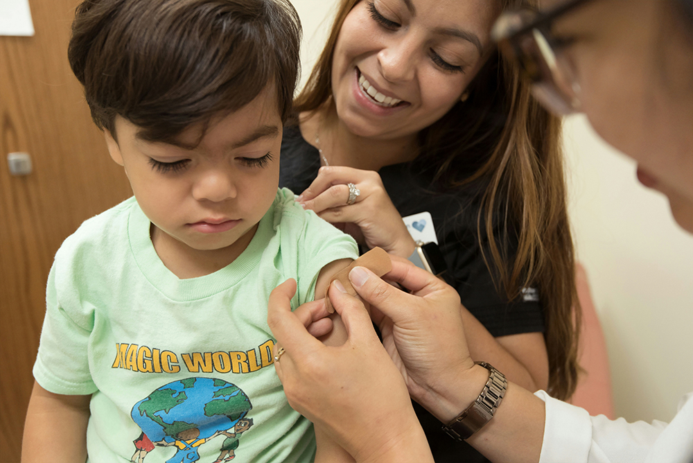 Photo of a doctor seeing a child at Kentucky Urgent Care